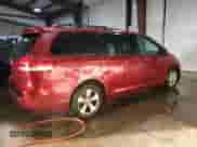 2014 Toyota Sienna LE with VIN 5TDKK3DC6ES518093, listed as a Copart auction lot 85151965 with 104,918 mi miles and Salvage title. Bid and sale history available at DreamBid. Image 3.