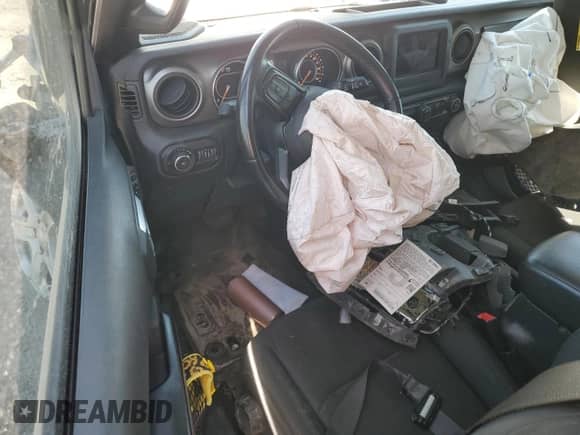 2020 Jeep Wrangler Sport S with VIN 1C4GJXAG8LW215563, listed as a Copart auction lot 70423945 with 69,559 mi miles and Salvage title. Bid and sale history available at DreamBid. Image 8.