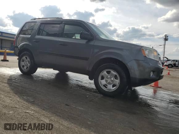 2011 Honda Pilot LX с VIN 5FNYF3H25BB002677, выставлен на аукционе Copart как лот 86169985 с пробегом 265 352 миль миль и Списание • Salvage title. История ставок и продаж доступна на DreamBid. Изображение 4.