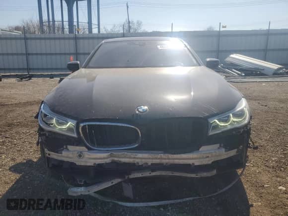 2016 BMW 7 Series 750i xDrive with VIN WBA7B0C51GG526703, listed as a Copart auction lot 48690465 with 73,853 mi miles and Salvage title. Bid and sale history available at DreamBid. Image 5.