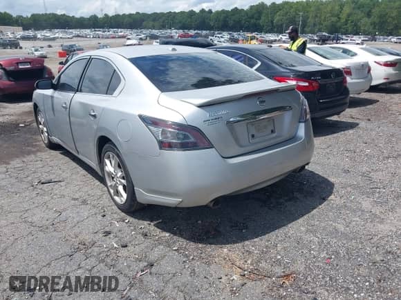 2014 Nissan Maxima S z VIN 1N4AA5AP6EC488666, wystawiony jako IAAI lot #42982216 z przebiegiem 250 486 mil mil oraz . Historia ofert i sprzedaży dostępna na DreamBid. Obrazek 3.