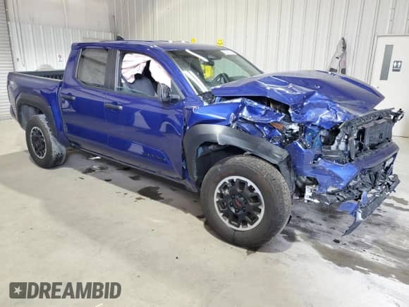 2024 Toyota Tacoma TRD Off Road with VIN 3TMLB5JN6RM026286, listed as a Copart auction lot 81666825 with 27,497 mi miles and Salvage title. Bid and sale history available at DreamBid. Image 4.