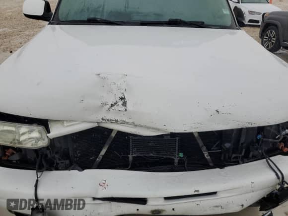 2004 Chevrolet Suburban LS with VIN 3GNFK16Z64G108020, listed as a Copart auction lot 43132865 with 289,464 mi miles and Salvage title. Bid and sale history available at DreamBid. Image 12.