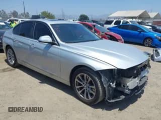 2018 BMW 3 Series 320i with VIN WBA8A9C59JAD27679, listed as a IAAI auction lot 42598541 with 90,976 mi miles and . Bid and sale history available at DreamBid. Image 1.