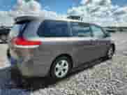 2012 Toyota Sienna with VIN 5TDZK3DCXCS233781, listed as a Copart auction lot 82167325 with 183,332 mi miles and Salvage title. Bid and sale history available at DreamBid. Image 3.