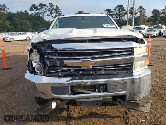 2015 Chevrolet Silverado 2500HD Work Truck с VIN 1GC1KUE84FF175779, выставлен на аукционе Copart как лот 84235465 с пробегом 187 633 миль миль и Списание • Salvage title. История ставок и продаж доступна на DreamBid. Изображение 5.