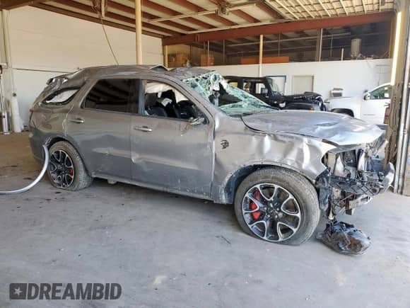 2021 Dodge Durango SRT Hellcat with VIN 1C4SDJH93MC801225, listed as a Copart auction lot 65273035 with 68,162 mi miles and Salvage title. Bid and sale history available at DreamBid. Image 4.