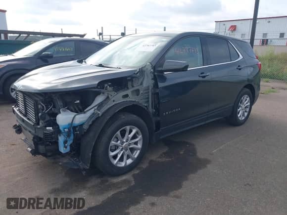 2020 Chevrolet Equinox LT z VIN 3GNAXTEV8LS597229, wystawiony jako IAAI lot #42787783 z przebiegiem 86 895 mil mil oraz . Historia ofert i sprzedaży dostępna na DreamBid. Obrazek 18.