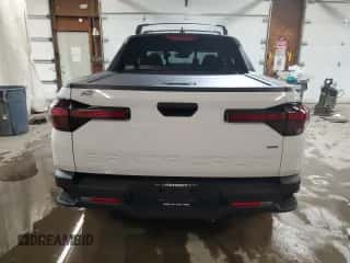 2022 Hyundai Santa Cruz SEL с VIN 5NTJCDAE5NH009205, выставлен на аукционе Copart как лот 77241474 с пробегом 32 417 миль миль и Списание • Salvage title. История ставок и продаж доступна на DreamBid. Изображение 6.