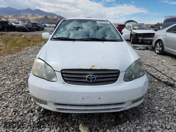 2003 Toyota Corolla CE с VIN 1NXBR32E93Z122986, выставлен на аукционе Copart как лот 83991745 с пробегом 299 999 миль миль и Списание • Salvage title. История ставок и продаж доступна на DreamBid. Изображение 5.