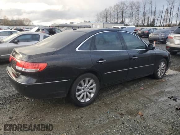 2010 Hyundai Azera Limited с VIN KMHFC4DF9AA459400, выставлен на аукционе Copart как лот 80528294 с пробегом 138 297 миль миль и Списание • Salvage title. История ставок и продаж доступна на DreamBid. Изображение 3.
