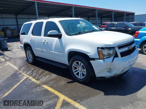 2014 Chevrolet Tahoe LS with VIN 1GNSCAE01ER191744, listed as a IAAI auction lot 43068276 with 275,886 mi miles and . Bid and sale history available at DreamBid. Image 1.