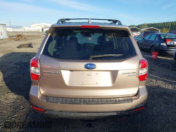 2016 Subaru Forester Touring with VIN JF2SJAXC9GH556784, listed as a IAAI auction lot 43378533 with 72,771 mi miles and . Bid and sale history available at DreamBid. Image 16.