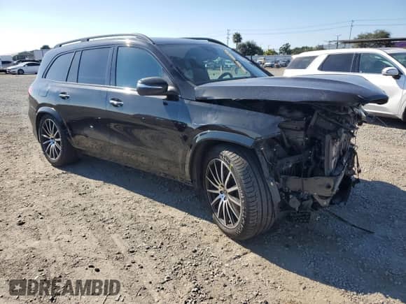 2022 Mercedes-Benz GLS 450 with VIN 4JGFF5KE6NA784034, listed as a Copart auction lot 65349685 with 46,606 mi miles and Salvage title. Bid and sale history available at DreamBid. Image 4.