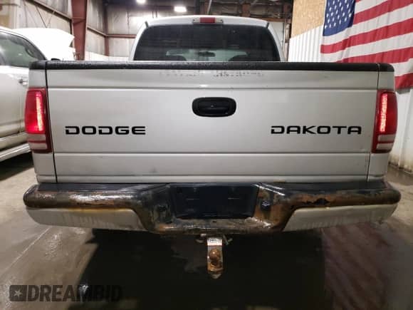 2003 Dodge Dakota с VIN 1D7HG38Z93S120302, выставлен на аукционе Copart как лот 50650255 с пробегом 196 681 миль миль и Списание • Salvage title. История ставок и продаж доступна на DreamBid. Изображение 6.