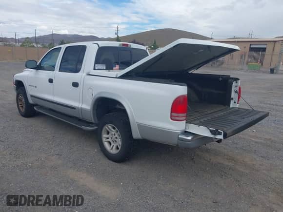 2001 Dodge Dakota Sport with VIN 1B7HG2AN31S256403, listed as a IAAI auction lot 43278698 with 270,046 mi miles and . Bid and sale history available at DreamBid. Image 3.