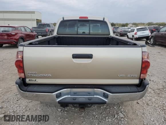 2005 Toyota Tacoma z VIN 5TEUU42N75Z113067, wystawiony jako Copart lot #75220034 z przebiegiem 123 653 mil mil oraz Szkoda całkowita • Salvage title. Historia ofert i sprzedaży dostępna na DreamBid. Obrazek 6.