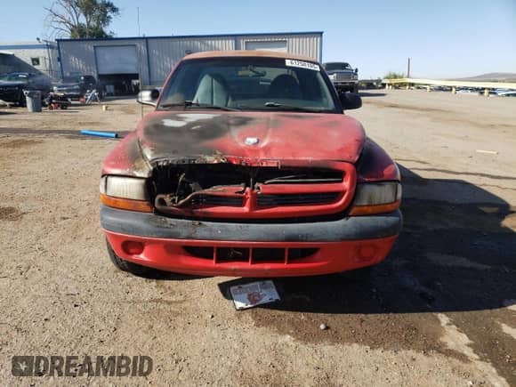 1998 Dodge Dakota SLT z VIN 1B7GL22X4WS693521, wystawiony jako Copart lot #61250105 z przebiegiem 97 534 mil mil oraz Szkoda całkowita • Salvage title. Historia ofert i sprzedaży dostępna na DreamBid. Obrazek 5.