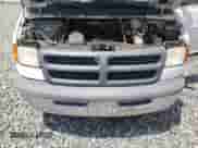 2000 Dodge RAM with VIN 2B4HB11Y1YK132067, listed as a Copart auction lot 58911665 with 147,473 mi miles and Clean title. Bid and sale history available at DreamBid. Image 12.