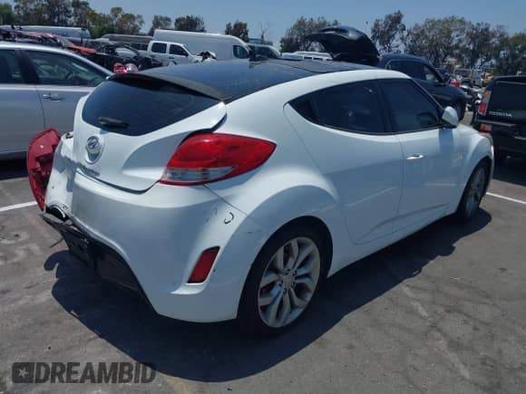 2012 Hyundai Veloster w/Black Int с VIN KMHTC6AD5CU056209, выставлен на аукционе IAAI как лот 42565571 с пробегом 137 908 миль миль и . История ставок и продаж доступна на DreamBid. Изображение 4.