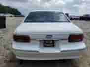 1993 Chevrolet Caprice Classic с VIN 1G1BL53E4PW140914, выставлен на аукционе Copart как лот 69377335 с пробегом 150 350 миль миль и Списание • Salvage title. История ставок и продаж доступна на DreamBid. Изображение 6.