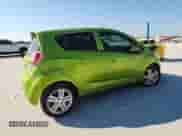 2014 Chevrolet Spark LS with VIN KL8CB6S94EC565436, listed as a Copart auction lot 86057295 with 106,927 mi miles and Salvage title. Bid and sale history available at DreamBid. Image 3.