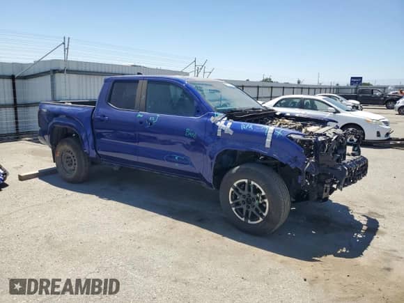 2024 Toyota Tacoma SR5 with VIN 3TMKB5FN4RM003206, listed as a Copart auction lot 64324035 with 8,012 mi miles and Salvage title. Bid and sale history available at DreamBid. Image 4.