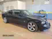 2007 Dodge Charger SRT-8 with VIN 2B3KA73W67H652417, listed as a Copart auction lot 70518705 with 75,440 mi miles and Salvage title. Bid and sale history available at DreamBid. Image 4.