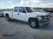 2004 Chevrolet Silverado 1500 Work Truck with VIN 1GCEC19Z74Z276603, listed as a Copart auction lot 70582324 with 211,118 mi miles and Salvage title. Bid and sale history available at DreamBid. Image 4.