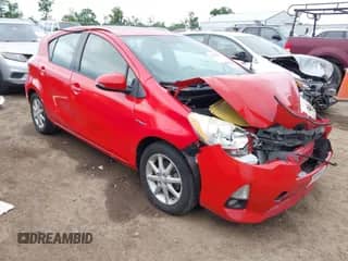 2013 Toyota Prius One z VIN JTDKDTB32D1044121, wystawiony jako IAAI lot #42389596 z przebiegiem 172 439 mil mil oraz . Historia ofert i sprzedaży dostępna na DreamBid. Obrazek 1.