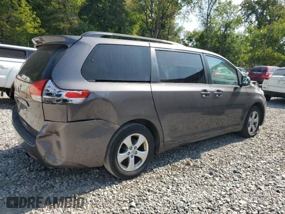 2013 Toyota Sienna LE AAS with VIN 5TDKK3DC7DS361673, listed as a Copart auction lot 71885195 with 211,654 mi miles and Clean title. Bid and sale history available at DreamBid. Image 3.