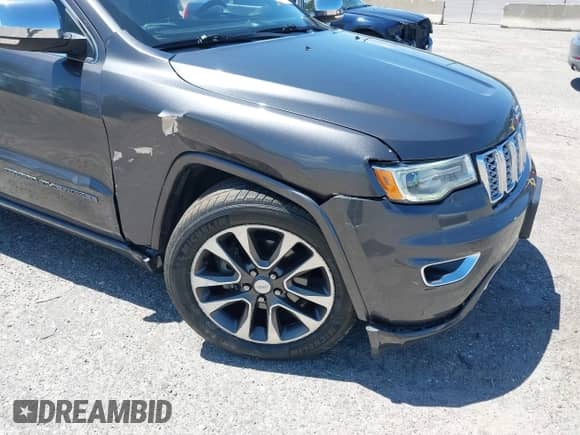 2017 Jeep Grand Cherokee Overland with VIN 1C4RJFCG2HC641791, listed as a IAAI auction lot 42566654 with 116,764 mi miles and . Bid and sale history available at DreamBid. Image 6.