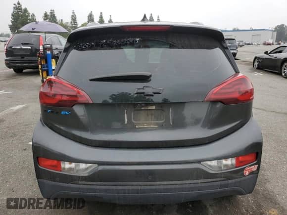 2017 Chevrolet Bolt EV Premier z VIN 1G1FX6S02H4140974, wystawiony jako Copart lot #69942603 z przebiegiem 107 935 mil mil oraz . Historia ofert i sprzedaży dostępna na DreamBid. Obrazek 6.