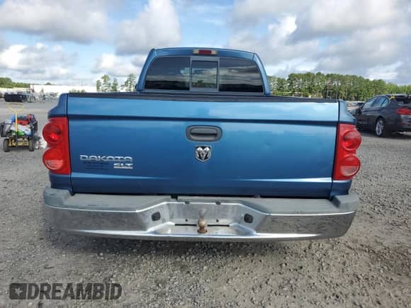 2006 Dodge Dakota SLT с VIN 1D7HE42K46S706479, выставлен на аукционе Copart как лот 64039925 с пробегом 174 414 миль миль и Списание • Salvage title. История ставок и продаж доступна на DreamBid. Изображение 6.