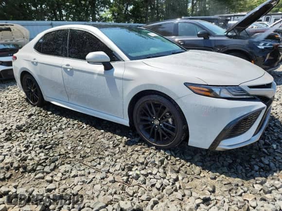 2022 Toyota Camry XSE with VIN 4T1K61BKXNU055868, listed as a Copart auction lot 65652195 with 56,360 mi miles and Salvage title. Bid and sale history available at DreamBid. Image 4.