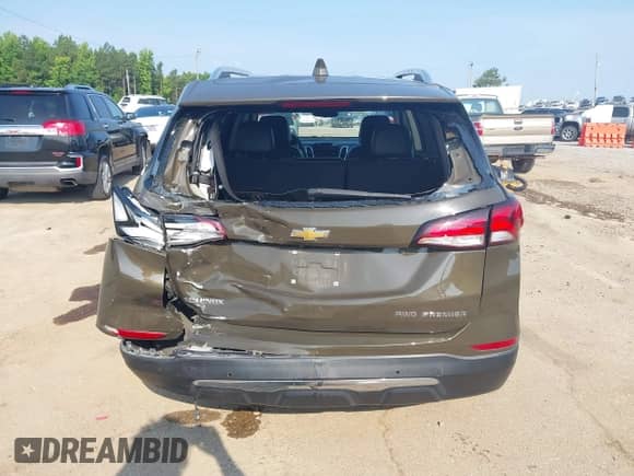2023 Chevrolet Equinox Premier z VIN 3GNAXXEG1PL181676, wystawiony jako IAAI lot #42396514 z przebiegiem 57 855 mil mil oraz . Historia ofert i sprzedaży dostępna na DreamBid. Obrazek 16.