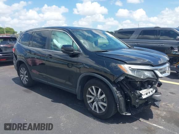 2020 Honda Pilot EX-L with VIN 5FNYF5H59LB006867, listed as a IAAI auction lot 42537418 with 57,725 mi miles and . Bid and sale history available at DreamBid. Image 1.