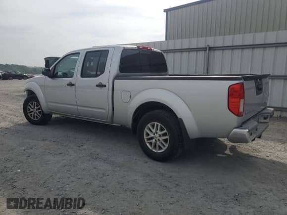 2015 Nissan Frontier SL with VIN 1N6AD0FV1FN713994, listed as a Copart auction lot 60617605 with 148,151 mi miles and Salvage title. Bid and sale history available at DreamBid. Image 2.