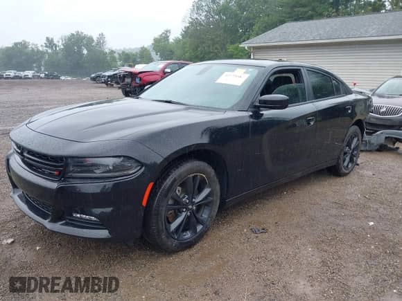 2023 Dodge Charger SXT with VIN 2C3CDXJG4PH589795, listed as a IAAI auction lot 42775587 with 24,850 mi miles and . Bid and sale history available at DreamBid. Image 2.