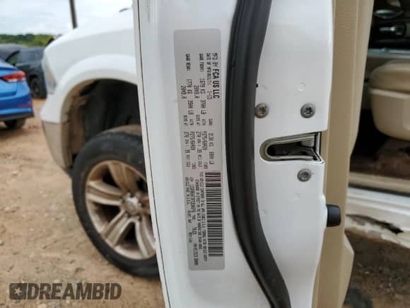 2015 Ram 1500 Laramie z VIN 1C6RR6NT3FS590976, wystawiony jako Copart lot #67740115 z przebiegiem 188 418 mil mil oraz Szkoda całkowita • Salvage title. Historia ofert i sprzedaży dostępna na DreamBid. Obrazek 12.