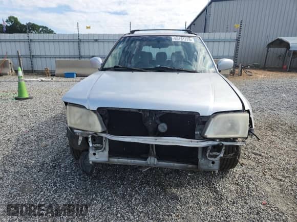 2002 Subaru Forester S with VIN JF1SF65692H723413, listed as a Copart auction lot 65161775 with 251,679 mi miles and Salvage title. Bid and sale history available at DreamBid. Image 5.