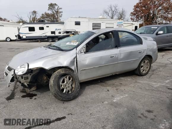 2004 Dodge Neon SXT with VIN 1B3ES56C24D640922, listed as a Copart auction lot 78077474 with 175,713 mi miles and Salvage title. Bid and sale history available at DreamBid. Image 1.