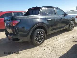 2022 Hyundai Santa Cruz SEL с VIN 5NTJC4AE2NH032666, выставлен на аукционе Copart как лот 77183894 с пробегом 32 828 миль миль и На запчасти • Non repairable. История ставок и продаж доступна на DreamBid. Изображение 3.