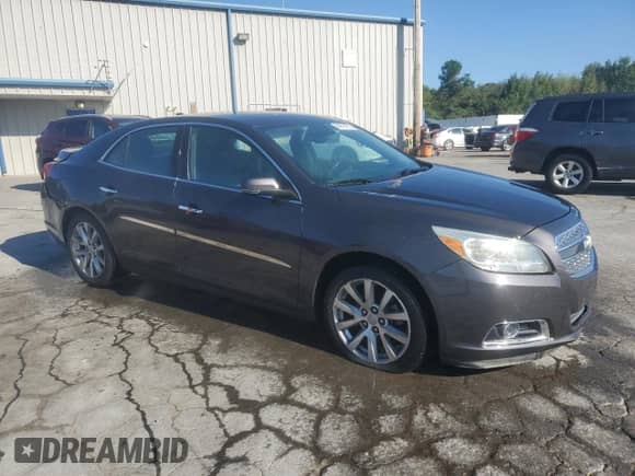 2013 Chevrolet Malibu LTZ с VIN 1G11H5SA7DF269186, выставлен на аукционе Copart как лот 84643435 с пробегом 157 541 миль миль и Списание • Salvage title. История ставок и продаж доступна на DreamBid. Изображение 4.