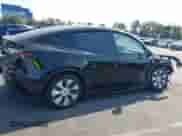 2023 Tesla Model Y Long Range z VIN 7SAYGAEE9PF851348, wystawiony jako IAAI lot #43167064 z przebiegiem Nie podano mil oraz . Historia ofert i sprzedaży dostępna na DreamBid. Obrazek 13.
