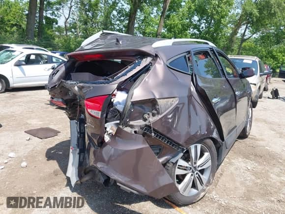 2014 Hyundai Tucson Limited z VIN KM8JU3AG2EU799894, wystawiony jako IAAI lot #42461514 z przebiegiem 319 102 mil mil oraz . Historia ofert i sprzedaży dostępna na DreamBid. Obrazek 4.