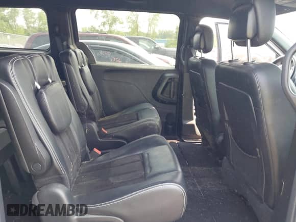 2014 Dodge Grand Caravan SXT with VIN 2C4RDGCG1ER463209, listed as a IAAI auction lot 42403781 with 79,387 mi miles and . Bid and sale history available at DreamBid. Image 8.