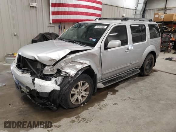 2010 Nissan Pathfinder SE with VIN 5N1AR1NN1AC622509, listed as a Copart auction lot 70288055 with 127,664 mi miles and Salvage title. Bid and sale history available at DreamBid. Image 1.