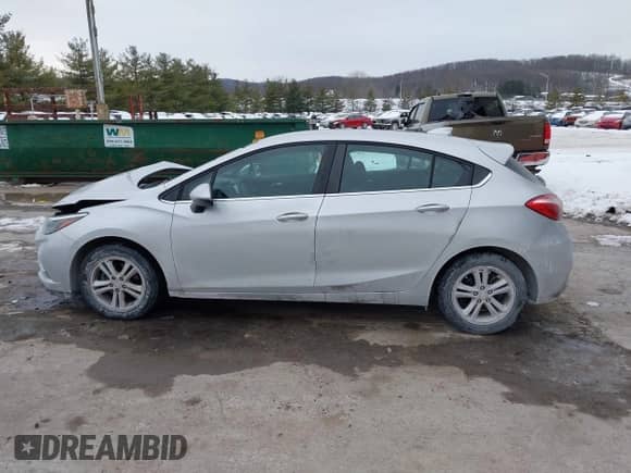2017 Chevrolet Cruze LT z VIN 3G1BE6SM9HS609257, wystawiony jako IAAI lot #41314653 z przebiegiem 140 627 mil mil oraz . Historia ofert i sprzedaży dostępna na DreamBid. Obrazek 15.