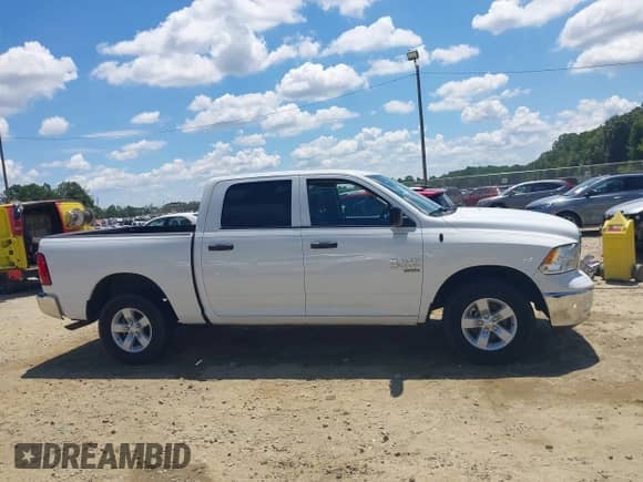 2019 Ram 1500 Tradesman z VIN 3C6RR7KGXKG723179, wystawiony jako IAAI lot #42856742 z przebiegiem Nie podano mil oraz . Historia ofert i sprzedaży dostępna na DreamBid. Obrazek 13.